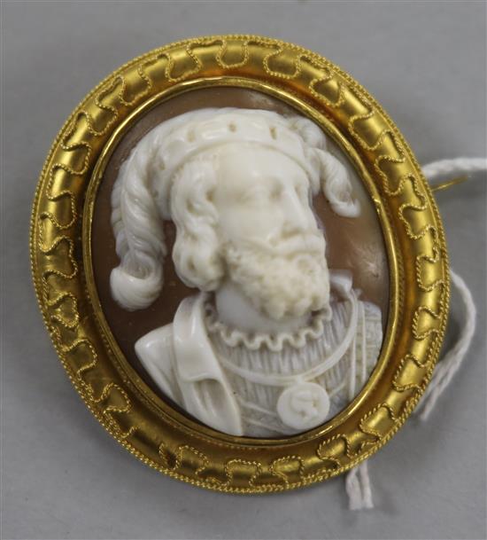 A Victorian gold framed oval cameo brooch carved with the bust of an Italian gentleman, 40mm.